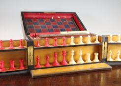 A Victorian burr walnut games compendium, the lid and front doors opening to reveal a fitted