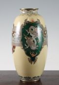 A Japanese silver wire cloisonne enamel ovoid vase, Meiji period, decorated with shaped reserves