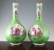 A pair of large Dresden porcelain bottle vases, late 19th century, decorated in the Helena
