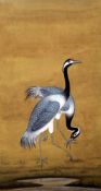 An Indian Mughal style gouache of two cranes, early 20th century, floral borders, 11.75in. x 9in.