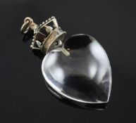 A 20th century continental heart shaped rock crystal pendant with coronet shaped metal bale, overall