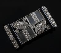 An Art Deco 14ct white gold, rock crystal, black onyx and diamond set brooch, of rectangular form,