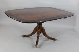 A 19th century mahogany and rosewood crossbanded breakfast table, the tip top on central turned