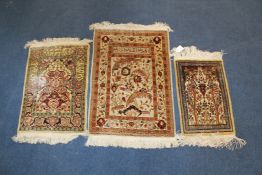 Two Persian part silk prayer mats and one other, 2ft 4in by 1ft 7in et infra.
