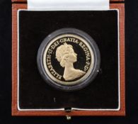 A 1981 proof gold £5 coin, 40 grams.