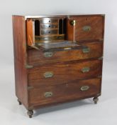 An Irish 19th century mahogany military secretaire chest, with small secretaire drawer opening to