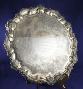 A large George III silver presentation salver, with later inscription and foliate engraving, of