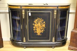 A Victorian ebonised breakfront credenza, with bowed glass end doors and central marquetry inlaid
