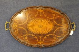 A 19th century mahogany and satinwood marquetry inlaid two handled tray, with serpentine moulded