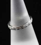A white gold and diamond full eternity ring, total diamond weight approximately 1.40ct, size M.