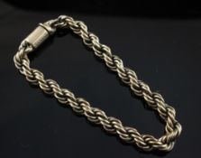 A 9ct gold rope twist bracelet, with engraved barrel clasp, 34.6 grams.