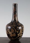 A Martin Bros. stoneware bottle vase, c.1898, decorated with pale brown poppies and scrolling leaves