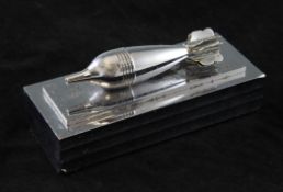 Edgar Brandt (1880-1960). "Obus", A chromium plated Art Deco paperweight, modelled as a mortar shell