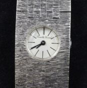 A lady`s 1960`s 9ct white gold Bueche Girod bracelet watch, with baton numerals and textured