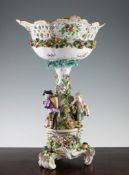 A Potschappel porcelain centrepiece bowl, late 19th century, the pierced and flower encrusted bowl