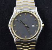 A gentleman`s stainless steel with 18ct gold bezel Ebel quartz wrist watch.