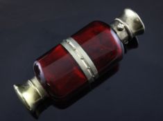 A late Victorian silver gilt mounted ruby glass double ended scent bottle by S. Mordan & Co, London,