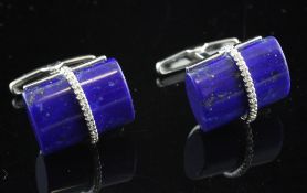 A pair of 18ct white gold, lapis lazuli and diamond cufflinks, set with ovoid lapis with diamond set