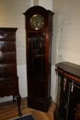 A 1930`s Continental mahogany thirty hour longcase clock, with brass dial and glazed trunk door, 6ft