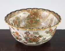 A Japanese Satsuma pottery bowl, Meiji period, the interior painted to shaped reserves with