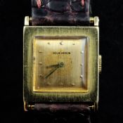 A lady`s French 18ct gold Boucheron manual wind wrist watch, the rectangular signed case with reeded