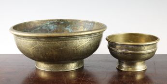 A late 19th/early 20th century engraved brass bowl, probably southern Indian, decorated with