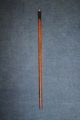 An Edwardian malacca cane swordstick, with horn handle and embossed silver finial decorated with