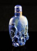 A Chinese lapis lazuli snuff bottle, early 20th century, carved in high relief with lingzhi fungus