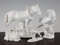A group of four Dresden white glazed porcelain animals and a bird, late 19th century, to include a