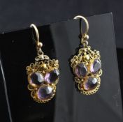A pair of late Victorian gold and amethyst earrings, each with filigree setting set with three