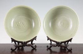 Two Chinese Longquan celadon flaring bowls, Ming dynasty (14th/15th century), each incised to the