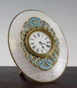 A late 19th century French oval white onyx and champleve enamelled strut clock, with white enamelled