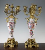 A pair of Chinese Mandarin famille rose vases, mounted as candelabra, the porcelain late 18th