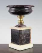 A 19th century circular Blue John urn, with everted rim, with later gilt bronze socle on a square