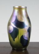 A Louis Comfort Tiffany Favrile art glass vase, with iridescent leaf decoration, signed L. C.
