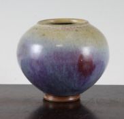A Junyao style ovoid vase, with purple splash decoration, unglazed foot rim, 8.5cm.