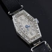 A lady`s early 20th century platinum and diamond set cocktail watch, with hexagonal case, Arabic