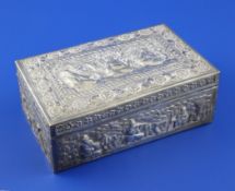 An early 20th century Chinese silver rectangular box, embossed with panels of seated figures