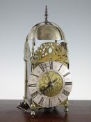 A Queen Anne brass lantern clock, with silvered Roman dial signed Tho. Lodge in Farnham, movement