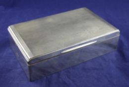 A 1960`s silver cigarette box, of rectangular form, with engine turned lid, William Neale & Son Ltd,