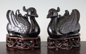 A pair of unusual Chinese lacquered burr wood figures of mandarin ducks, 20th century, each in