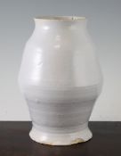 Roger Fry for Omega Workshops. An angular tin glazed pottery vase, c.1914, large incised Omega