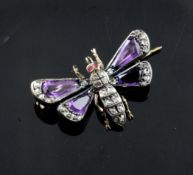 A Victorian gold and silver, amethyst, ruby and rose cut diamond set butterfly brooch, 0.75in.