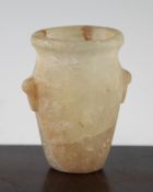 An ancient Egyptian two handled vase, probably Old Kingdom, c.2006-2200 BC, of ovoid form, carved