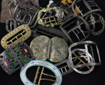 A small collection of assorted 18th century and later shoe and belt buckles, including silver,