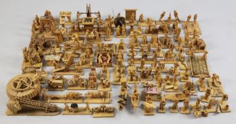 A large collection of Chinese wood figures and groups undertaking work, pastimes and punishment,