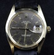 A gentleman`s early 1970`s 14ct gold Rolex Oyster Perpetual Date wrist watch, with brushed golden