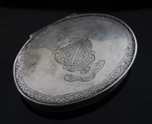 A late 18th century silver oval snuff box, with engraved armorial and initials, unmarked, 3in.