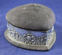 An Edwardian repousse silver mounted heart shaped trinket box with pin cushion lid, maker`s mark