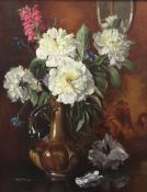 § Albert Williams (1922-2010)oil on canvas,Peonies and stocks in a pottery vase,signed,24 x 20in.